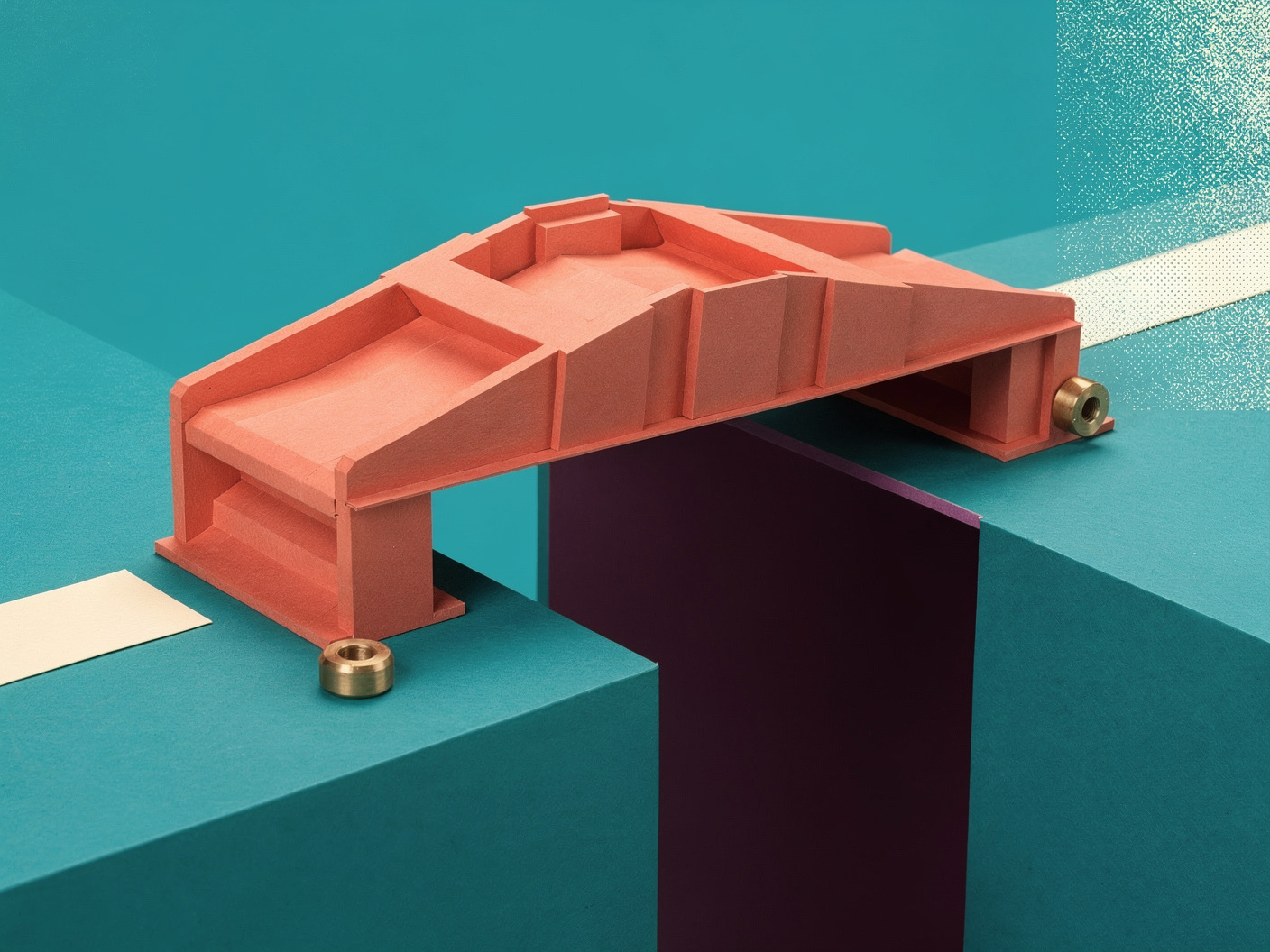 A coral paper bridge spans a deep plum break between teal platforms; small brass support pieces sit beside its ends.
